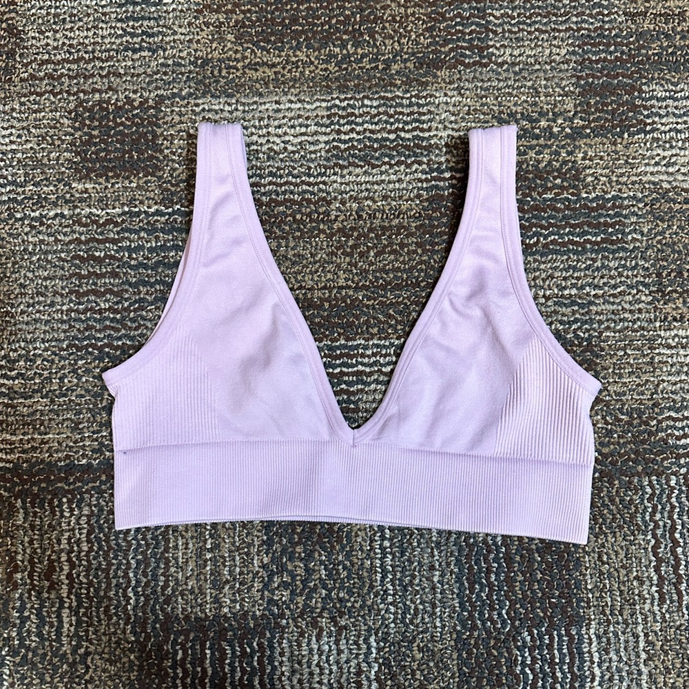 Cute lilac workout top by WeWoreWhat!!!!
Super great quality, never worn